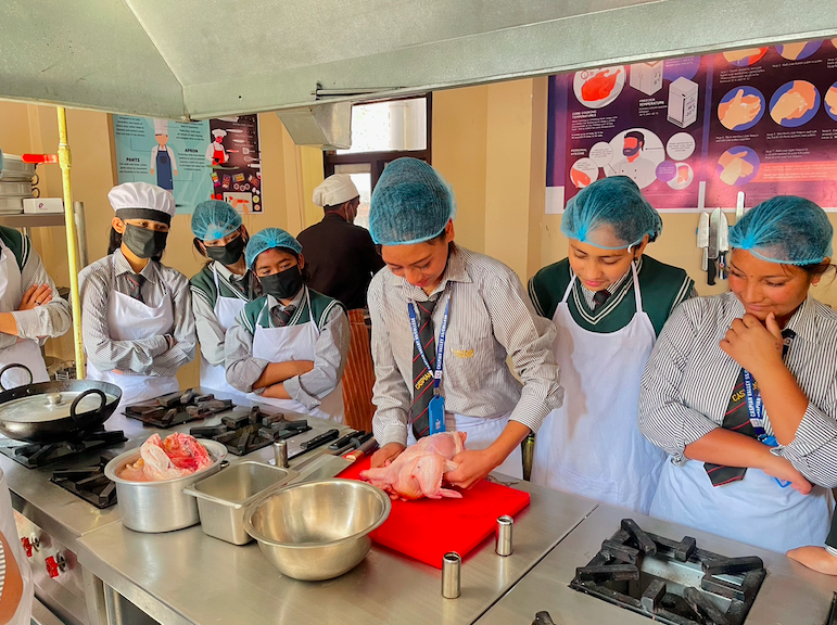 Hotel Management students in kitchen practical